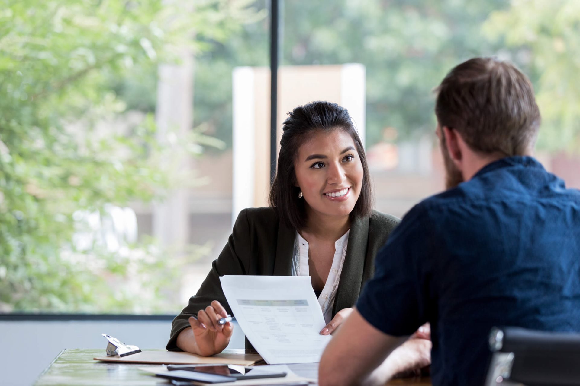 Young woman interviewing a potential candidate.